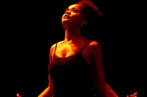 Pearl Young, A22, alumna and founder of the Harlem Grooves Dance Company, performed an interpretive dance during "We Move: Black Joy at Tufts" on October 4. 